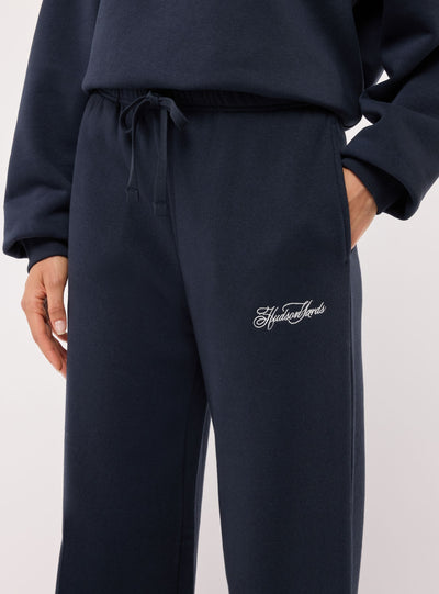 Pantaloni tuta wide leg con ricamo college