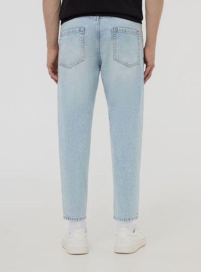 Loose fit jeans with small rips