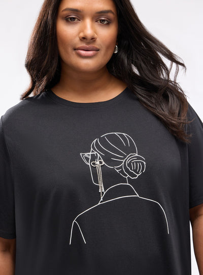 T-shirt con stampa grafica e applicazione