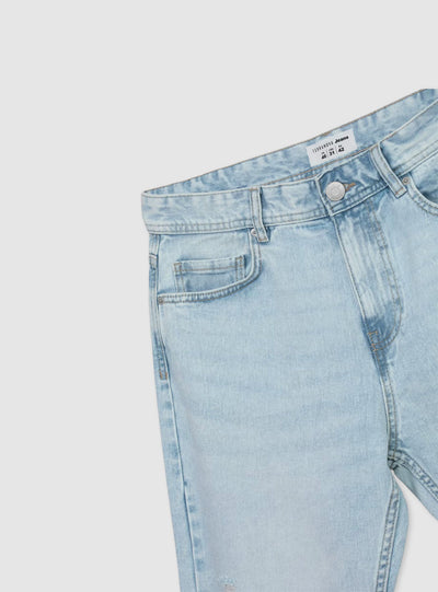 Light loose-fit jeans with rips