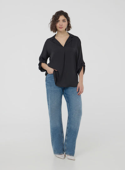 Plain-coloured blouse with V-neckline