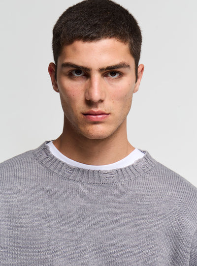 Maglia boxy con strappi