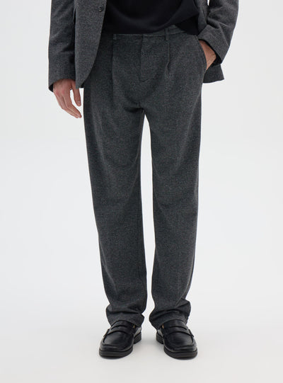 Pantaloni chino con pieghe a pied de poule