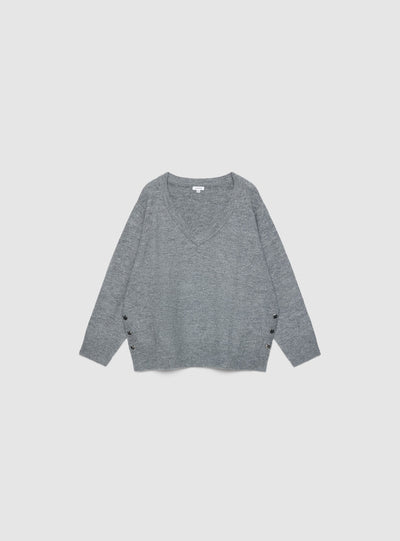 Plain-coloured top with V-neck and side buttons