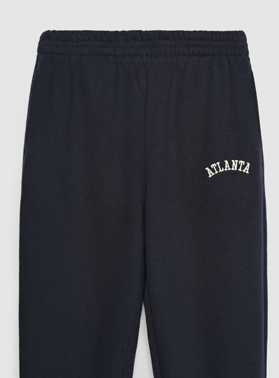 Pantaloni tuta vita alta con scritta college