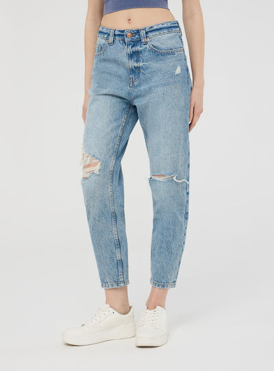 Jeans mom con strappi acid wash