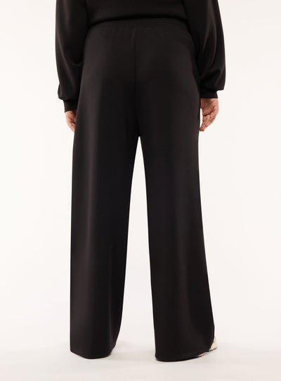 Pantaloni tuta wide leg a tinta unita