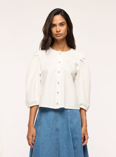 Blusa con bottoni gioiello e maniche a sbuffo