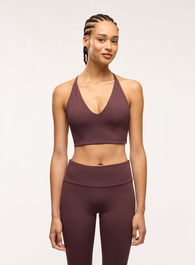 Bra top sportivo tinta unita con scollo a V