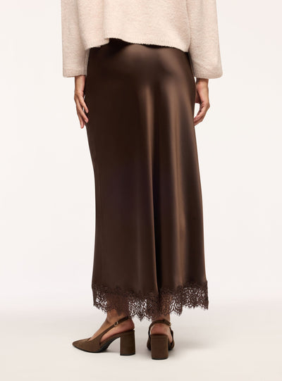 Gonna lunga svasata in satin con bordo in pizzo