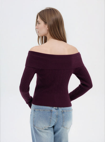 Maglia a trecce con zip e collo ampio