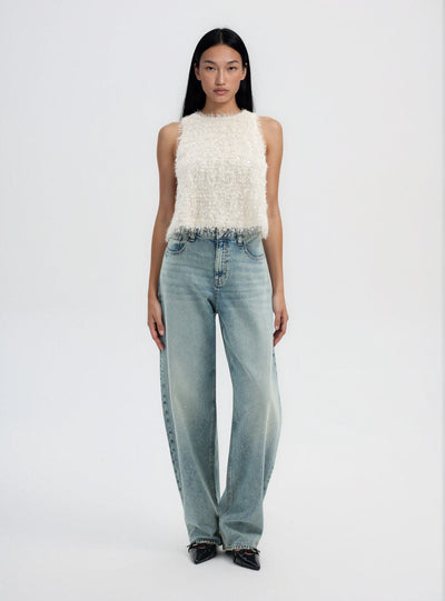 Top con paillettes e effetto piumette