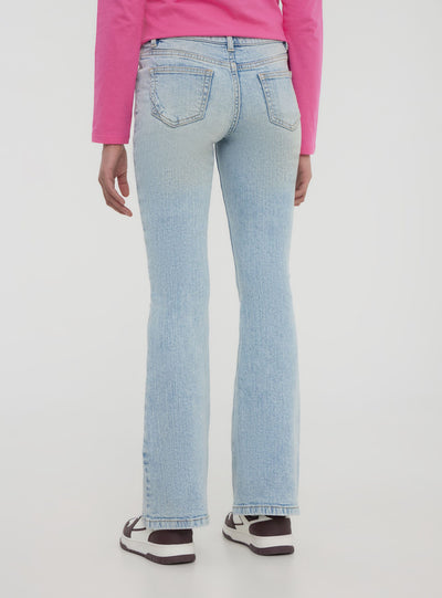 Jeans chiari a zampa con strappi