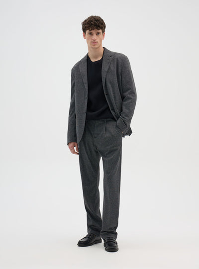 Pantaloni chino con pieghe a pied de poule