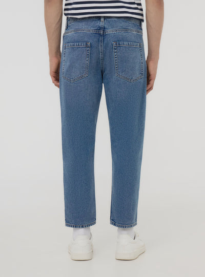 Loose fit jeans with small rips