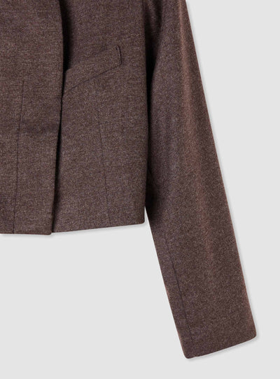 Asymmetric solid-colour crop jacket