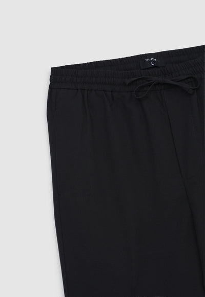 Pantaloni con elastico in vita e coulisse tinta unita