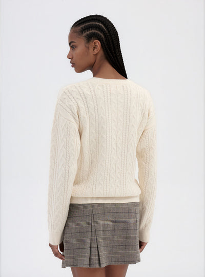 Maglia con trecce e scritta