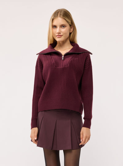 Maglia a coste con zip al collo
