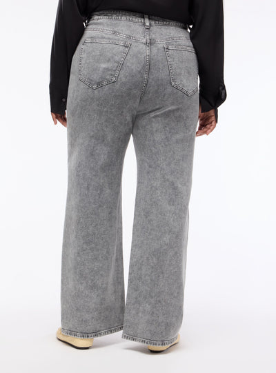 Jeans wide leg con borchie