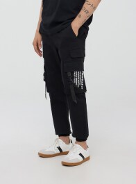 Pantaloni con scritte sales