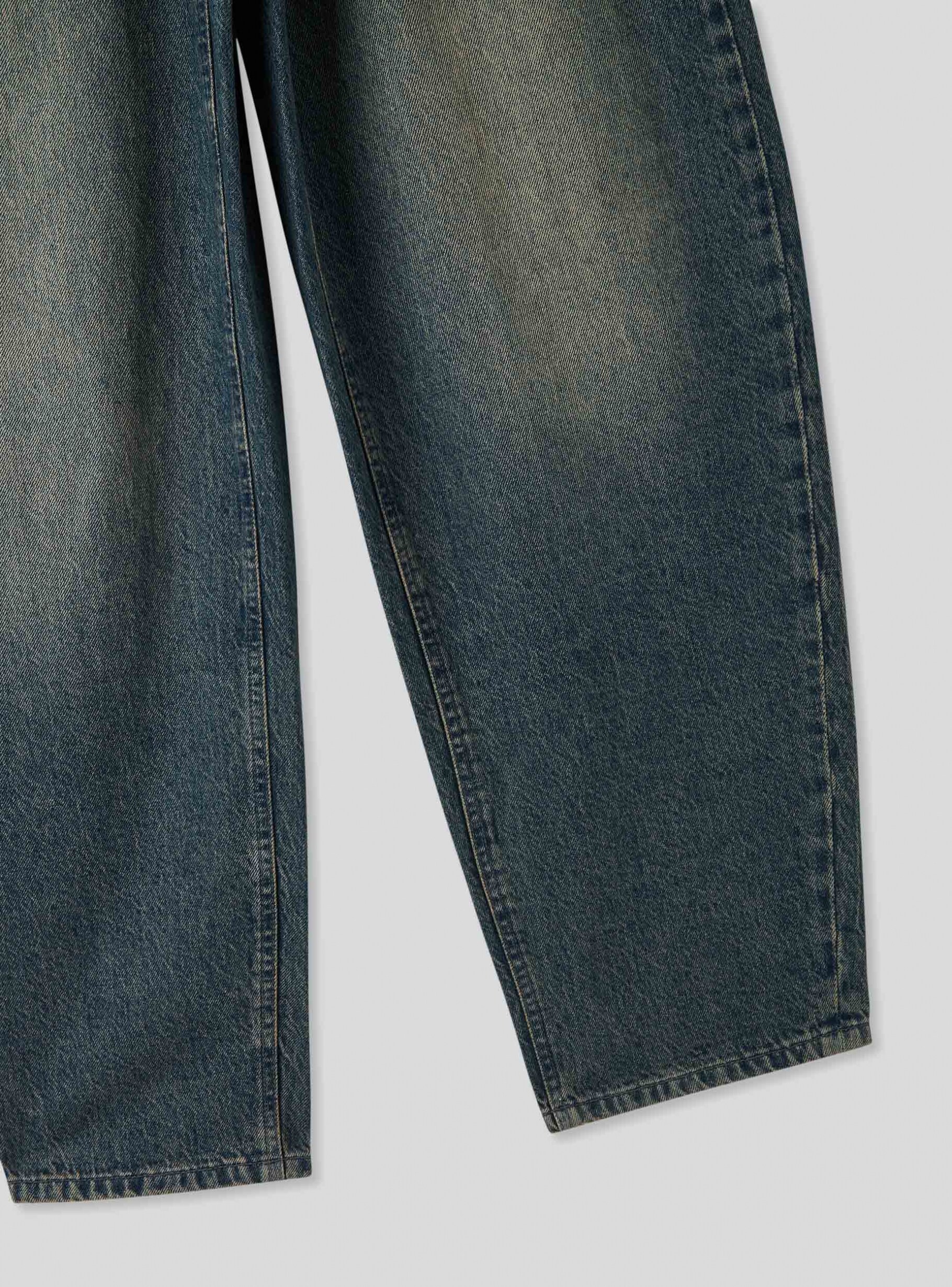 Dark blue denim Balloon fit jeans with a sandblasted finish