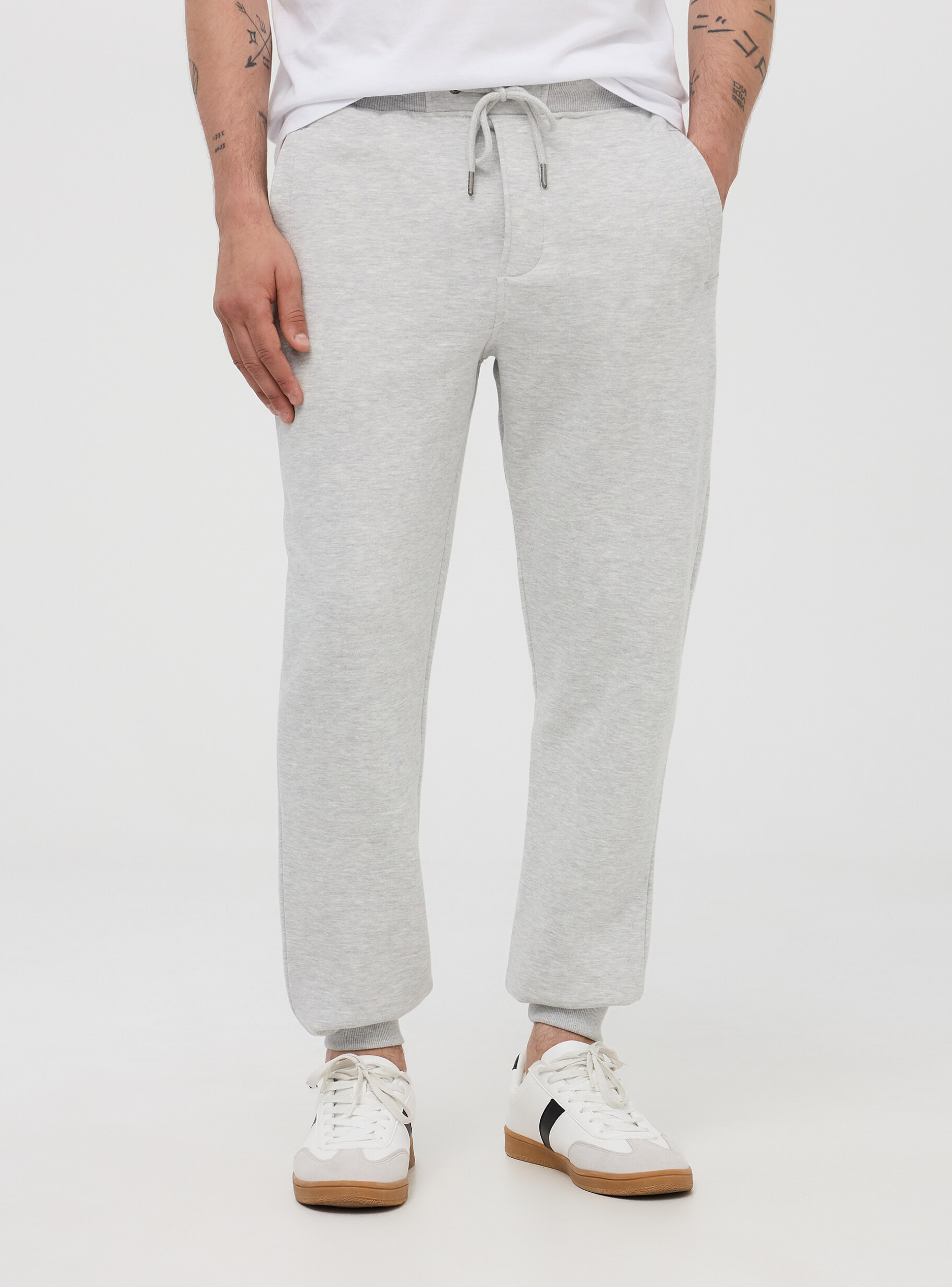 Light grey melange Tracksuit bottoms in heavy fabric with a drawstring and  cuffs - Buy Online | Terranova