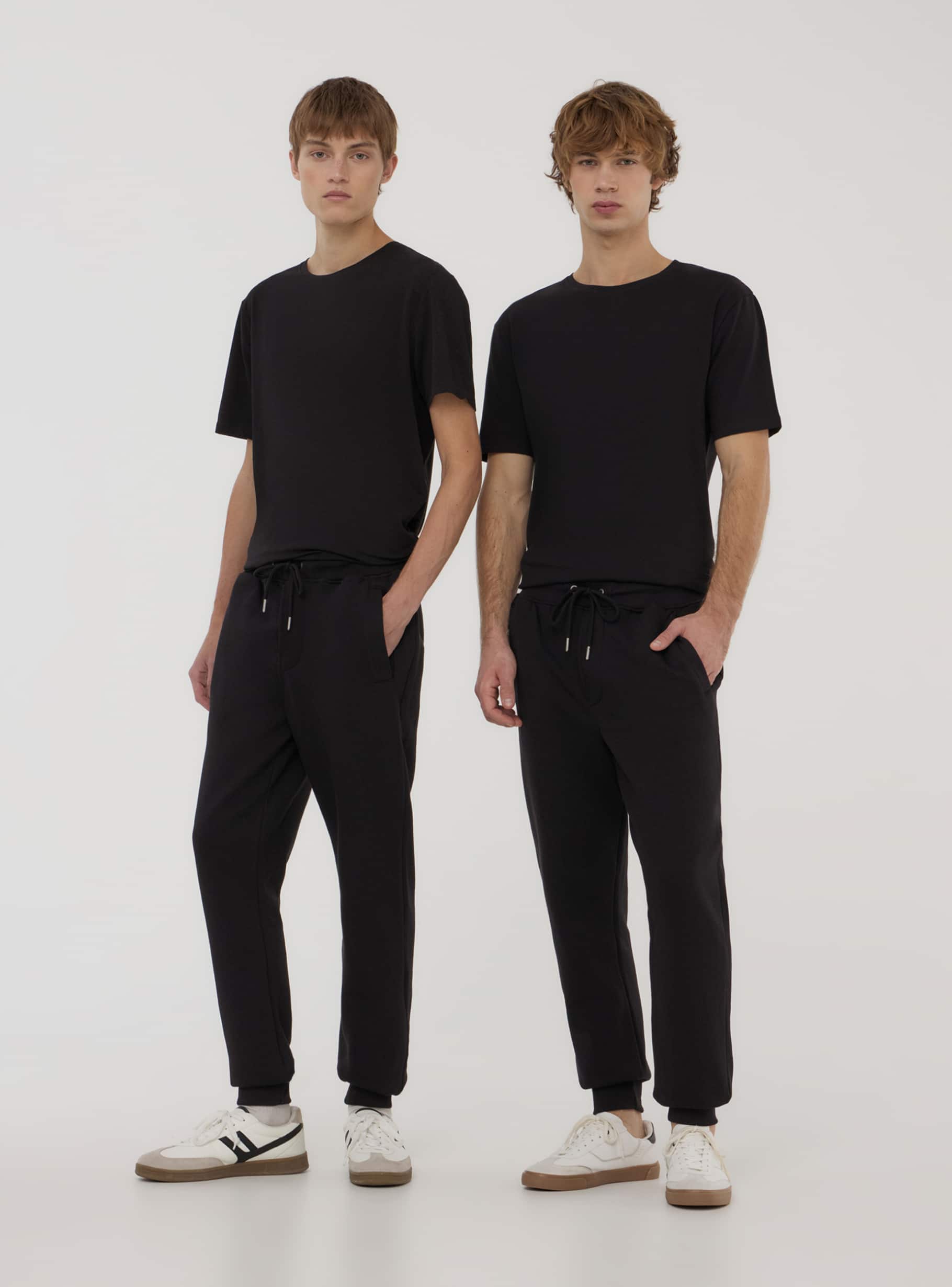 Black 2-pack of tracksuit bottoms in heavy fabric with drawstrings and  cuffs - Buy Online | Terranova