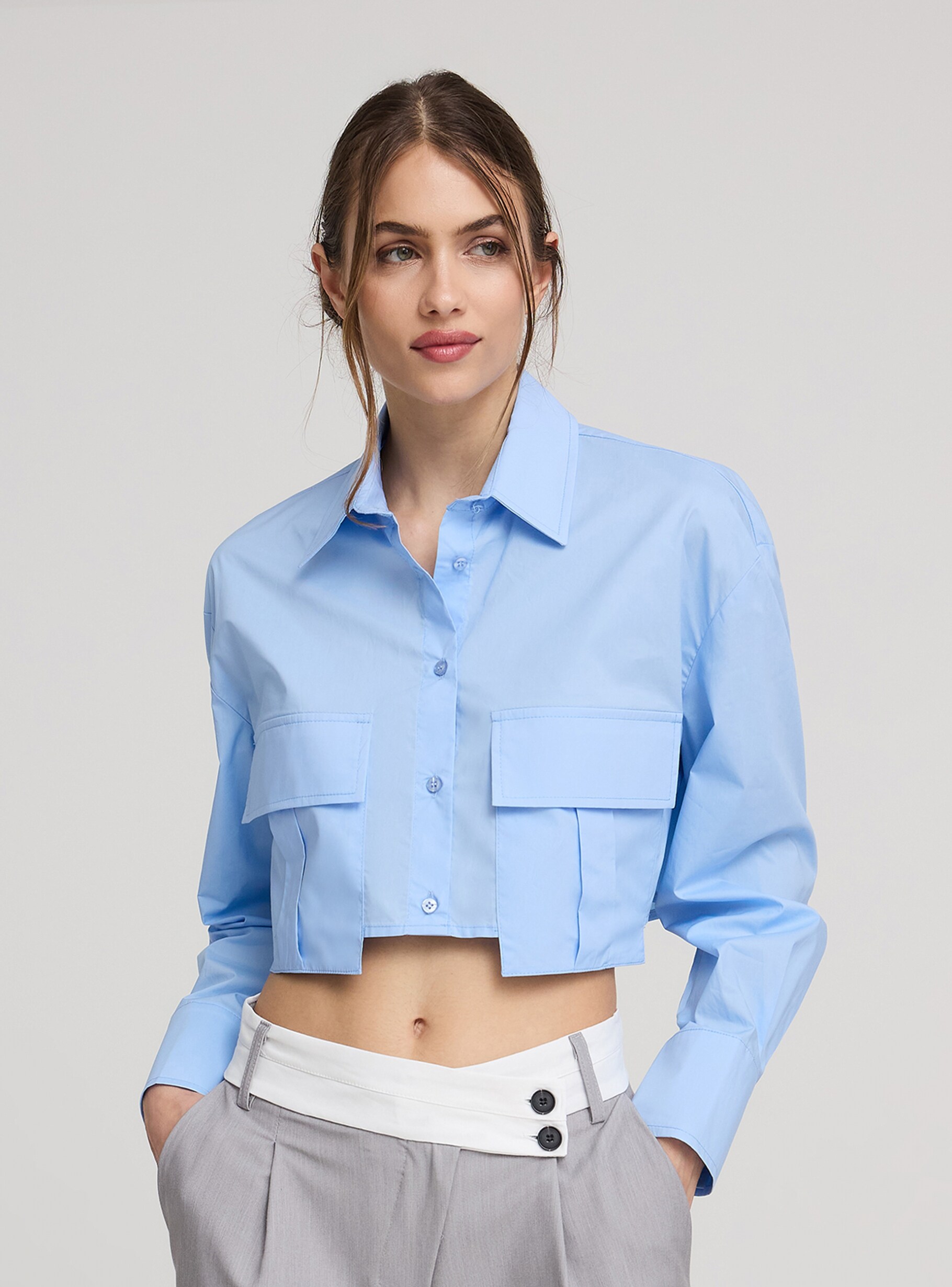 Sky-blue Cropped shirt with large pockets - Buy Online