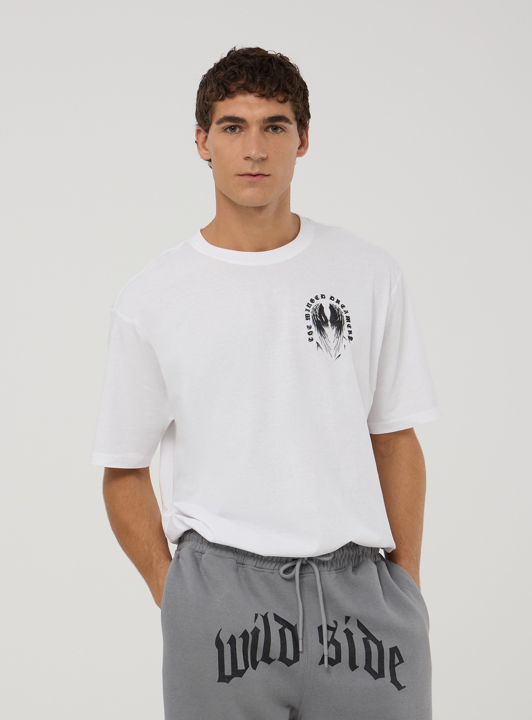 【U LAN】Budapest Back Printing Short Sleeve Optical white Oversized T-shirt with a wing print on the