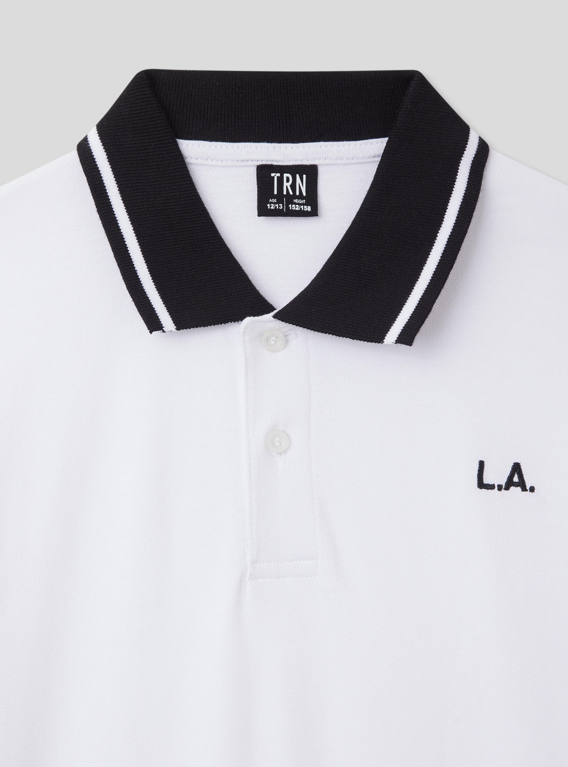 Optical white Polo with embroidery and contrasting trims