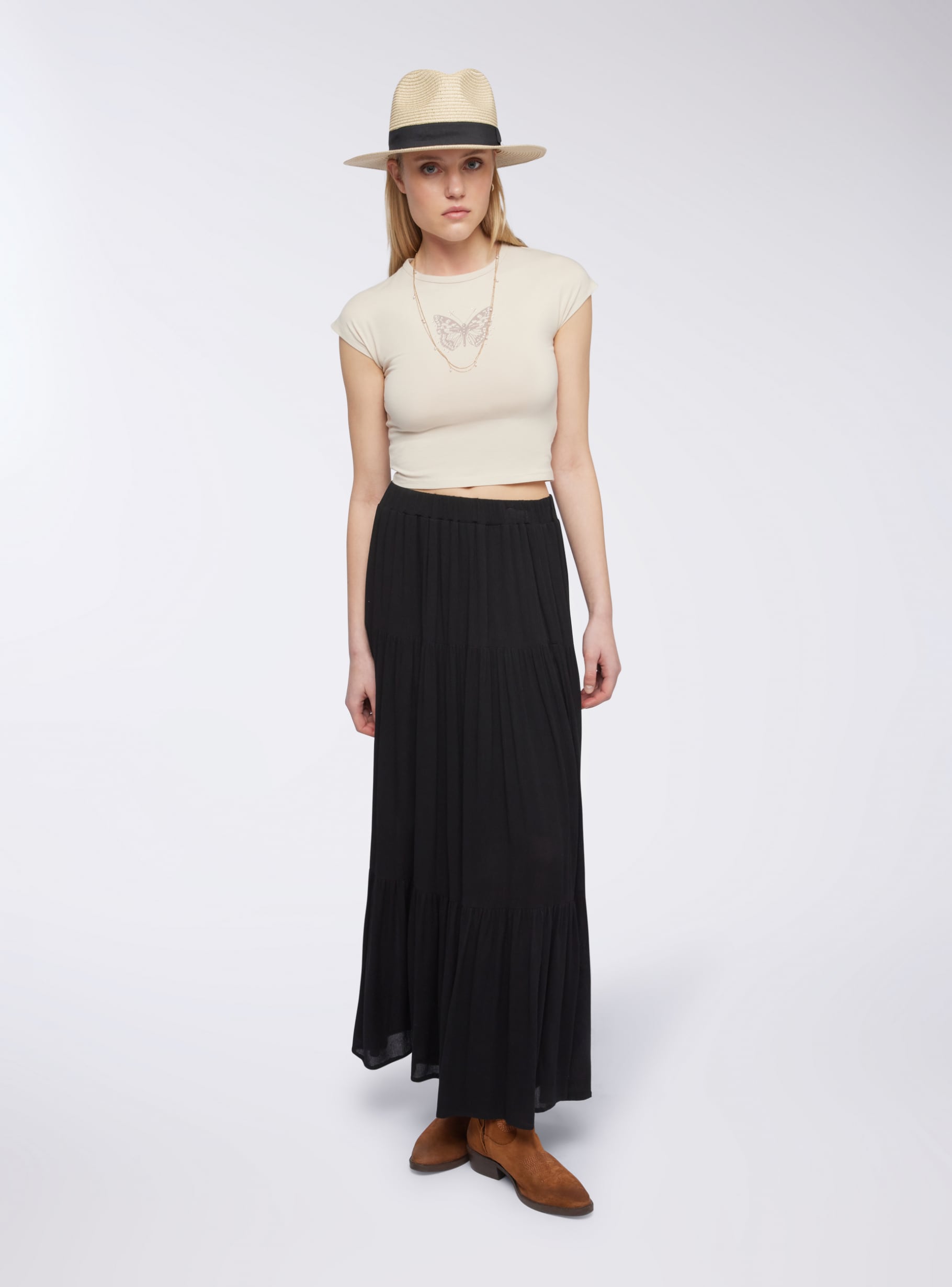 Black Long skirt with ruffles in a solid colour - Buy Online