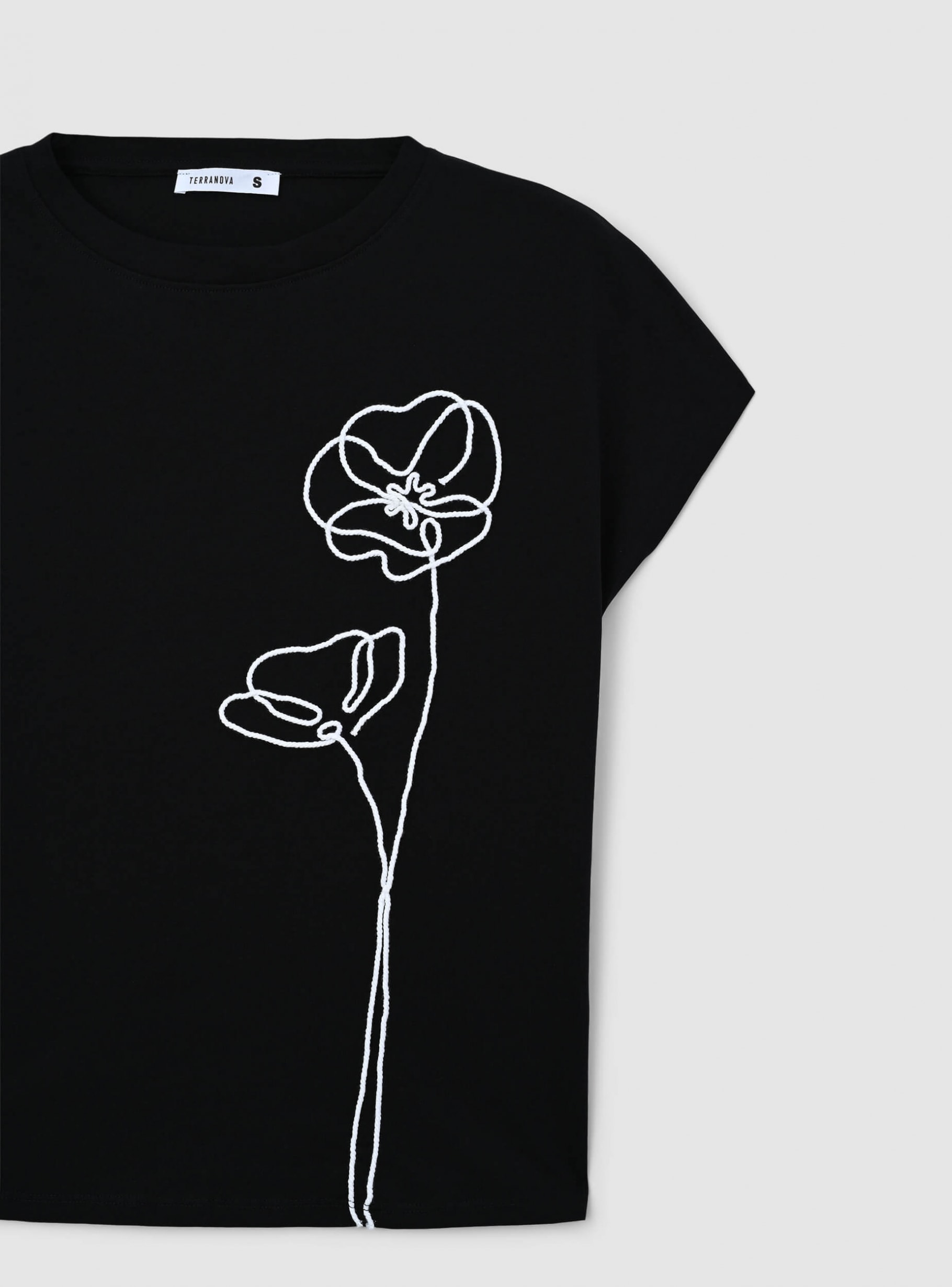 Black Wide T-shirt with stylised flower appliqué - Buy