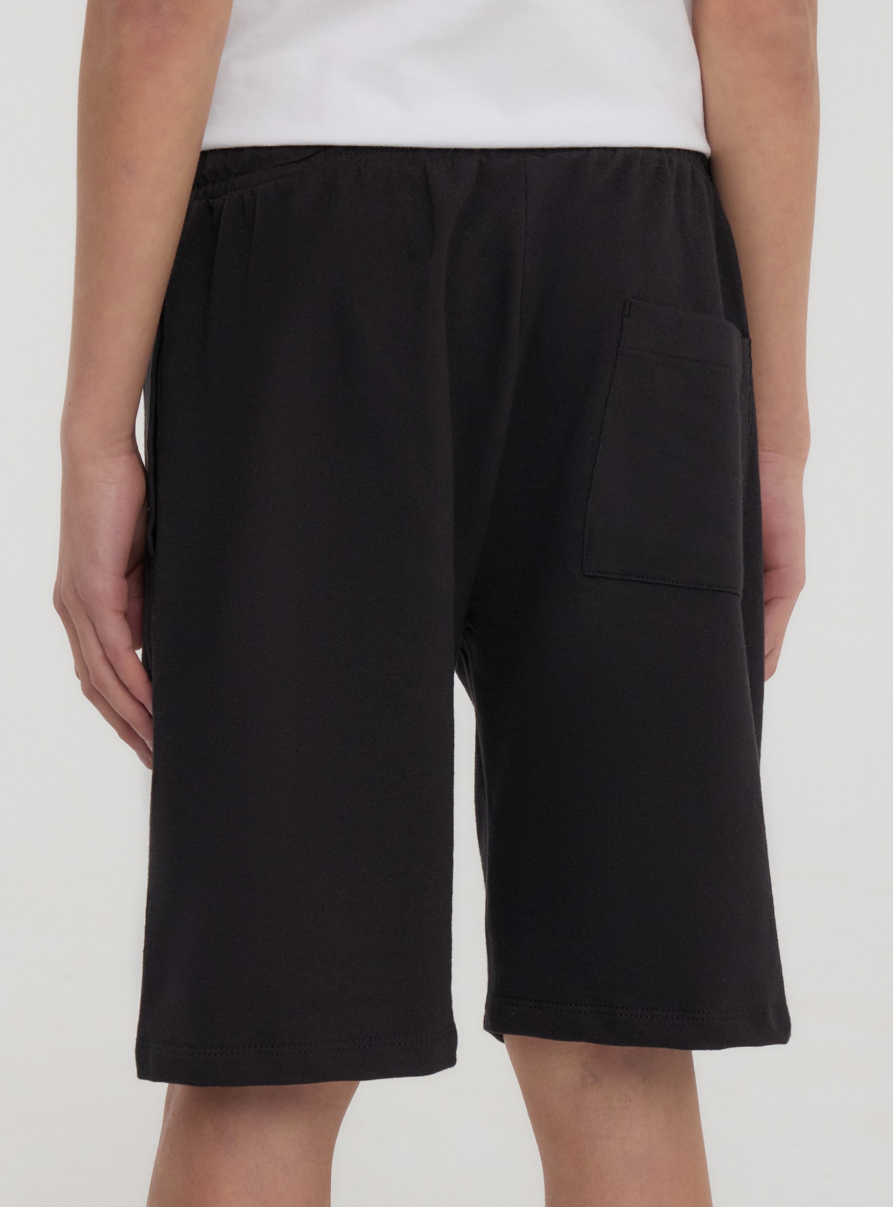 Black Tracksuit shorts with Gothic-style lettering - Buy