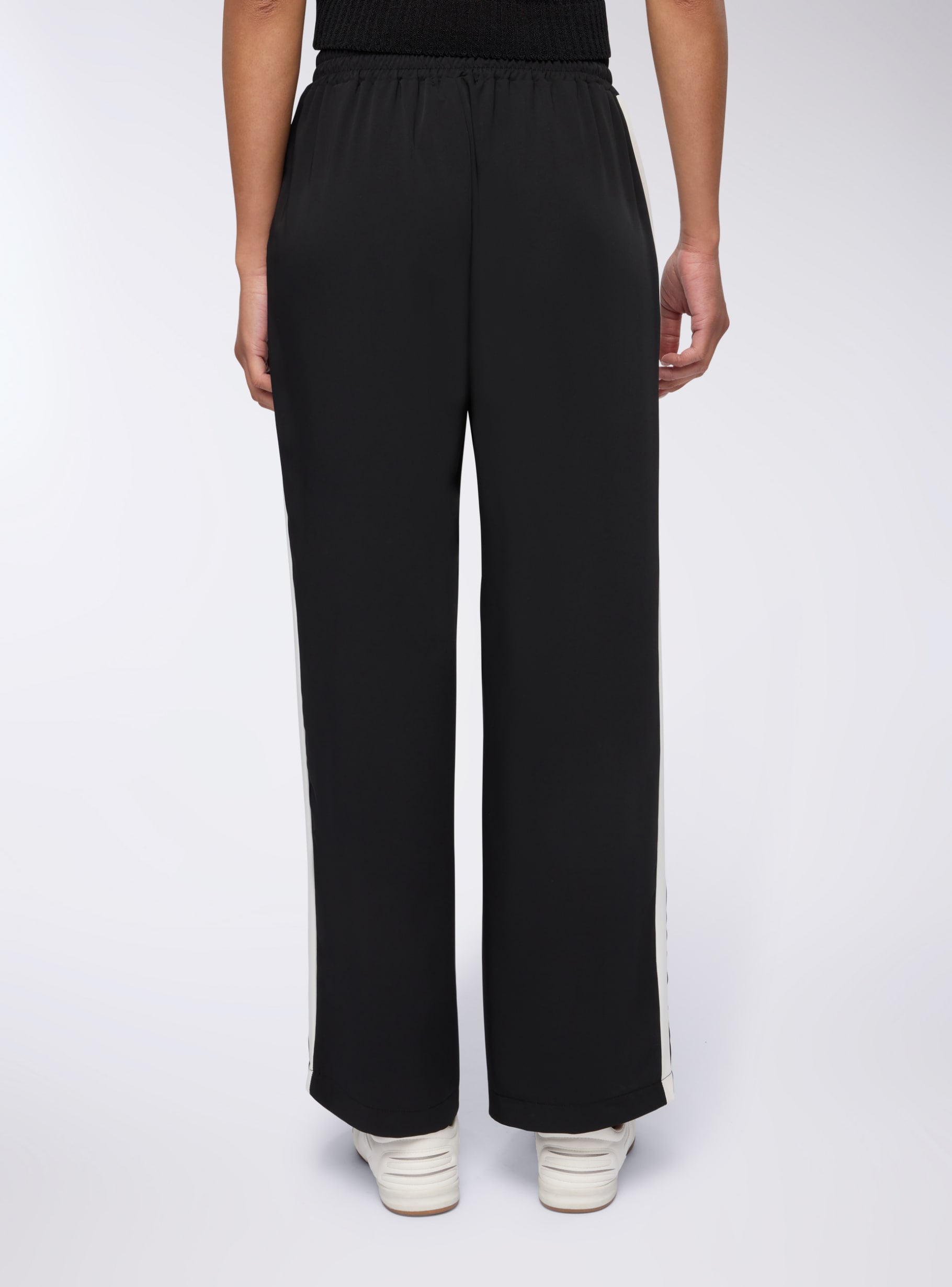 Black Wide-leg trousers with side stripe - Buy Online