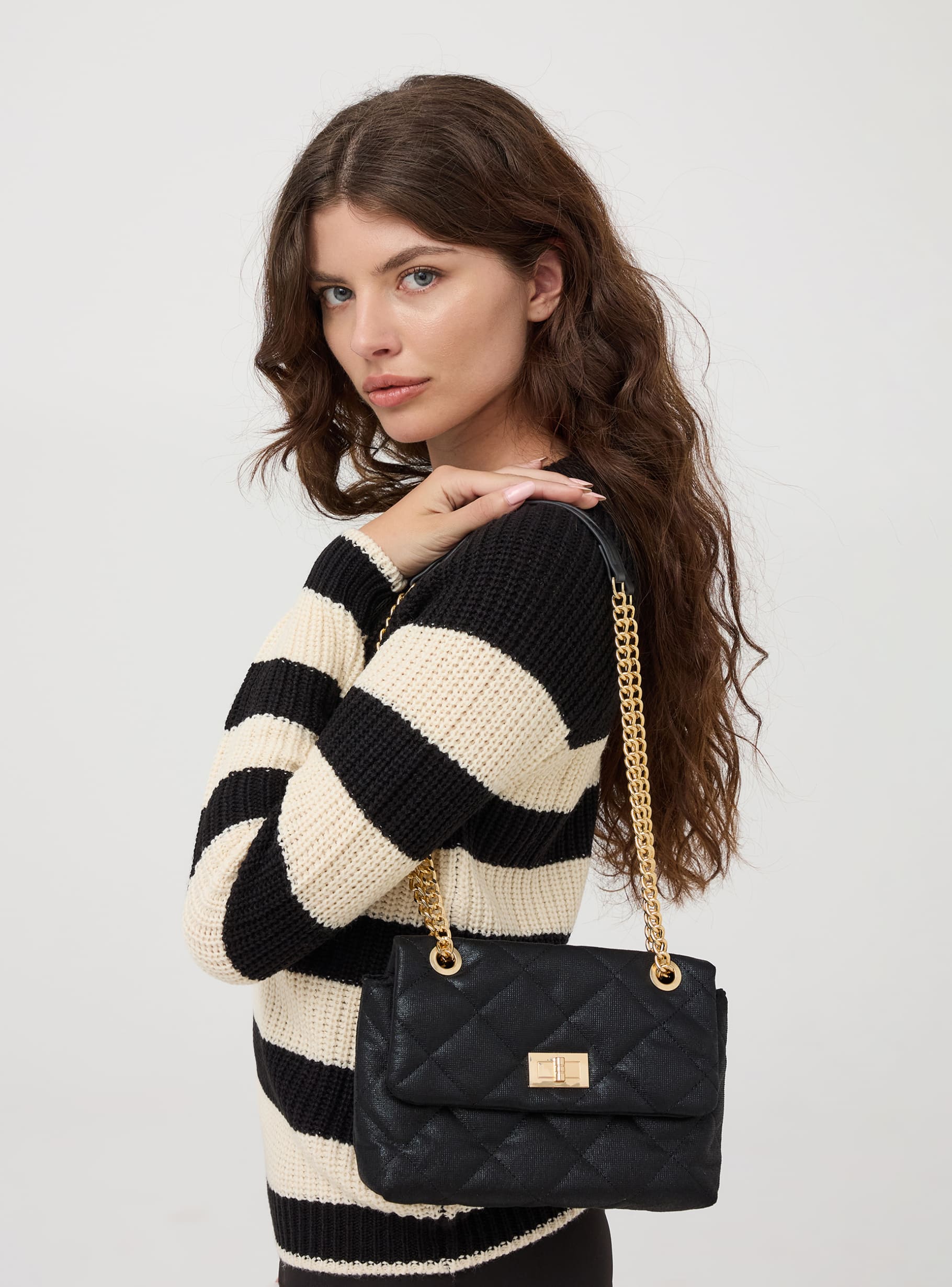 Black quilted cross body bag discount