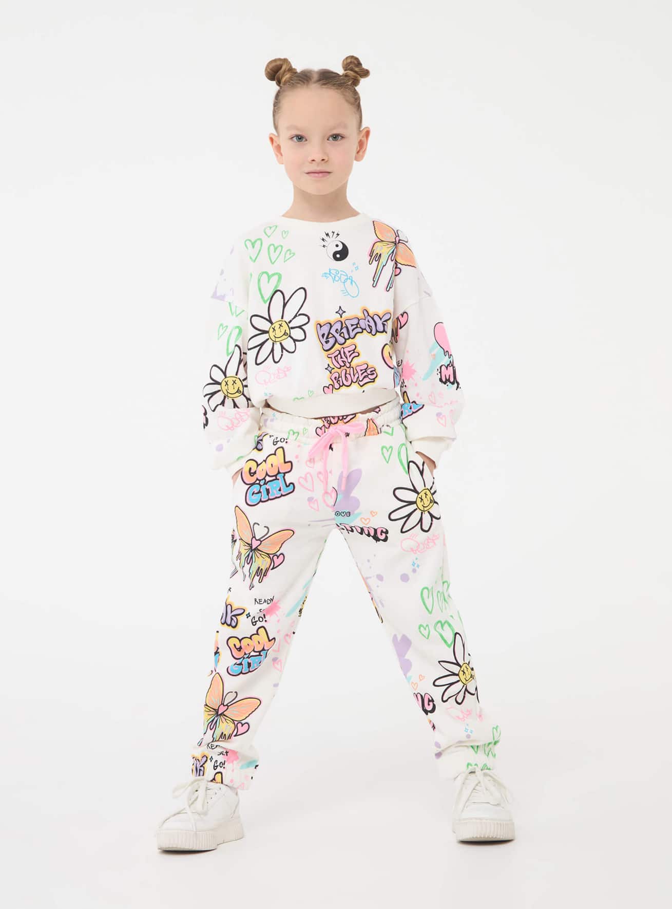 Pantaloni tuta con stampa graffiti colorati