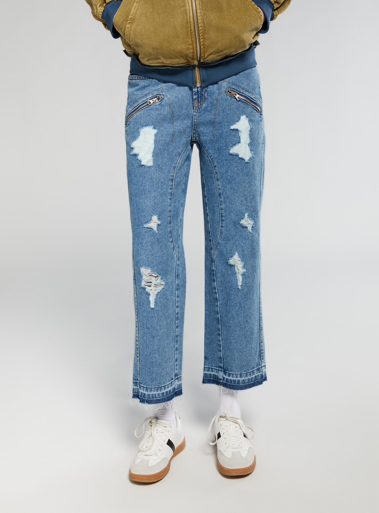 Jeans regular con coulisse, zip e strappi TRNPOPLAB