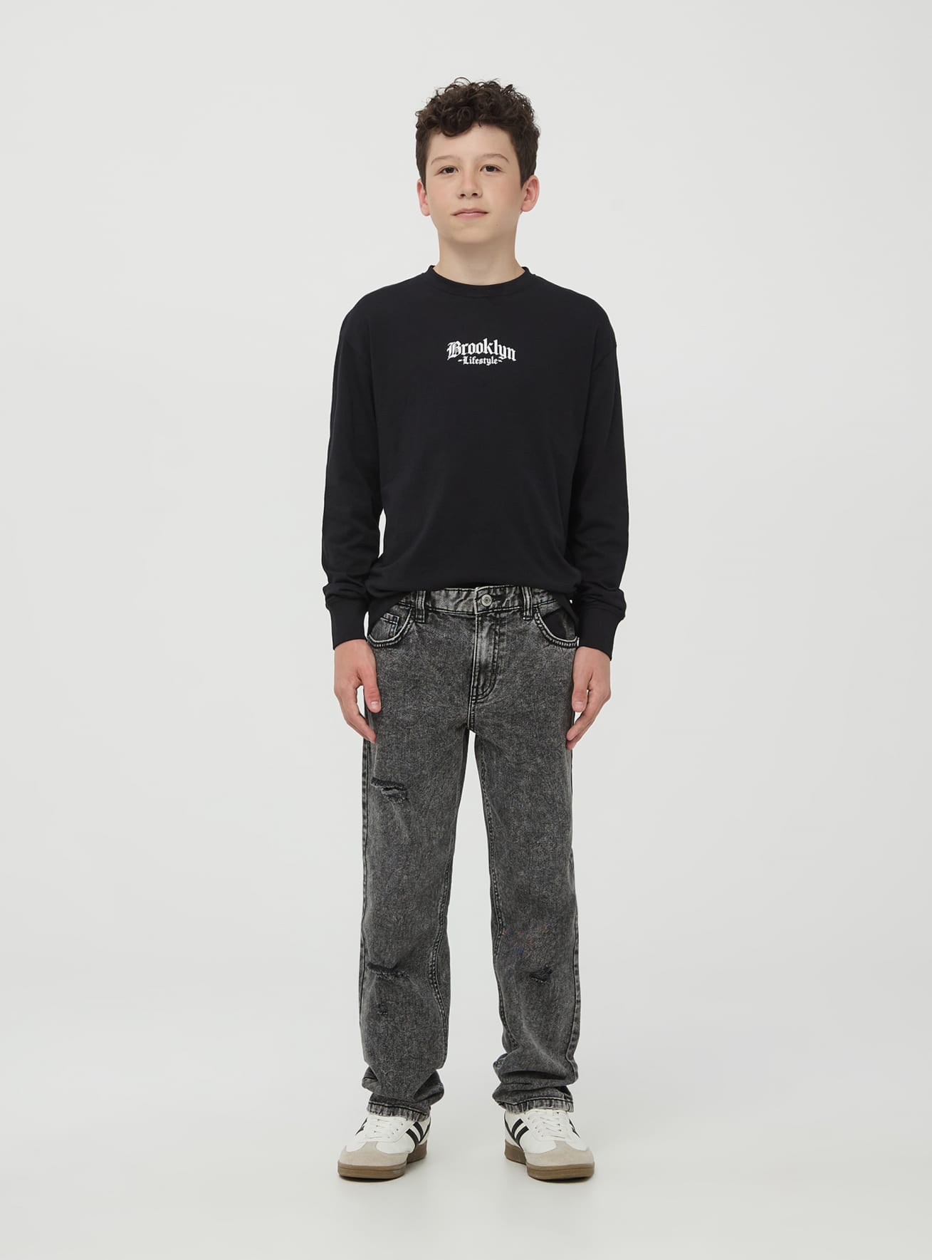 Jeans effetto vintage con strappi