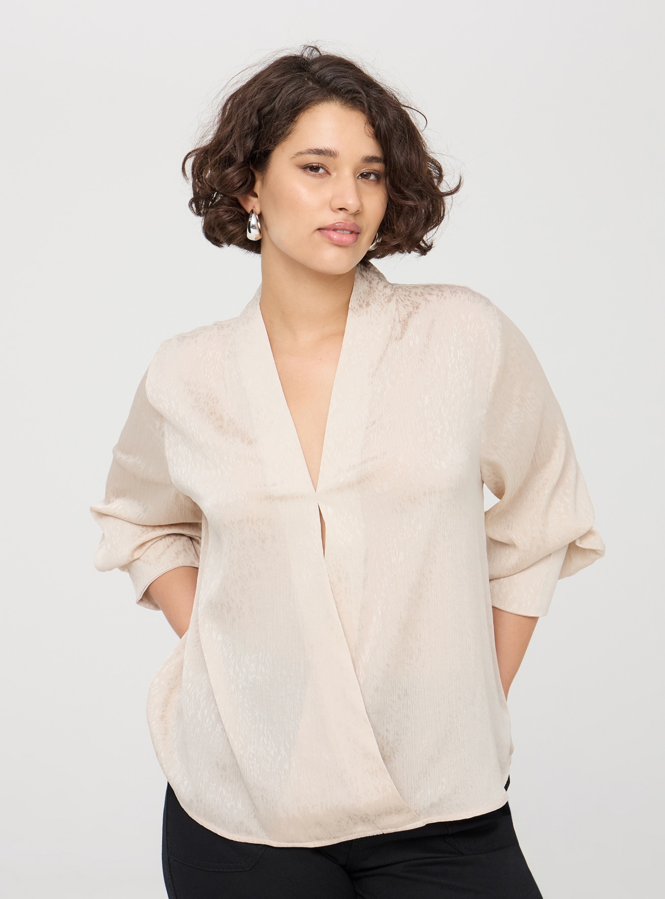 Blusa con scollo a v incrociato