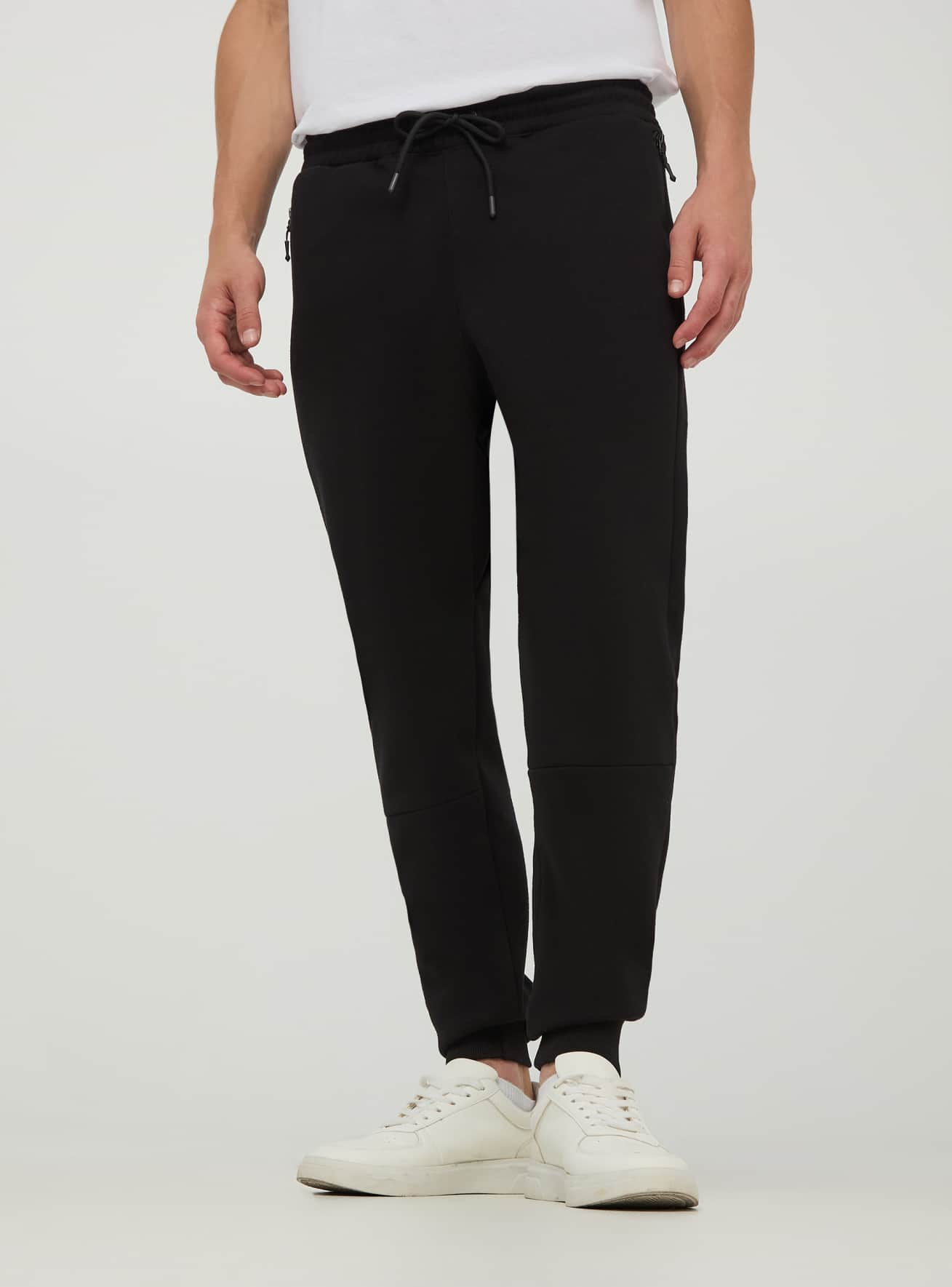 Black Technical fabric tracksuit bottoms with zipped pockets Buy Online Terranova