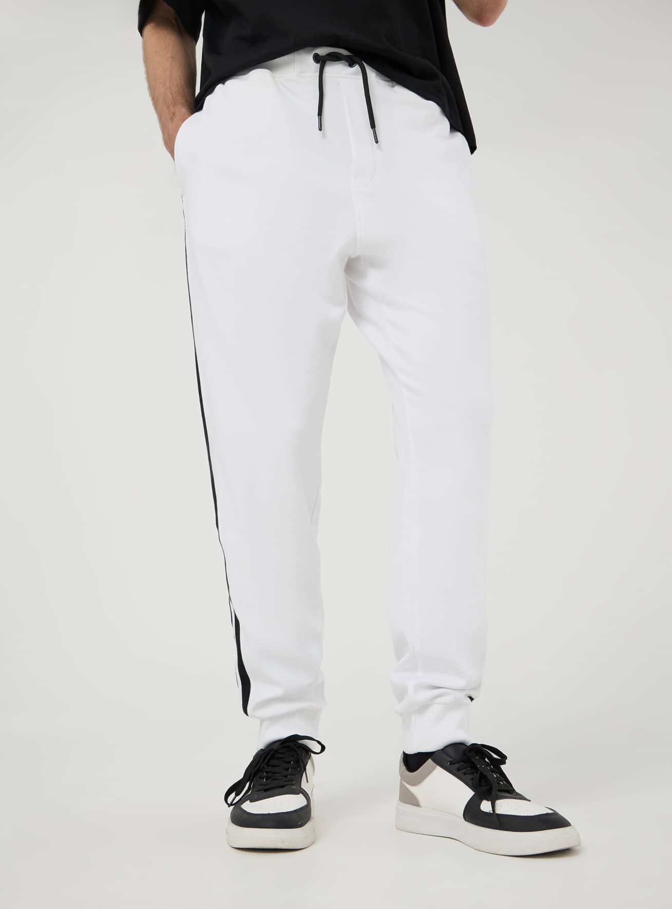 Tracksuit bottoms with white stripe hotsell