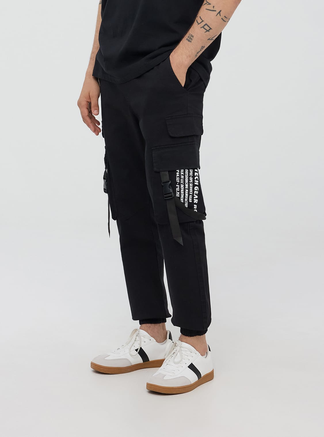 Black Cargo trousers with lettering Buy Online Terranova