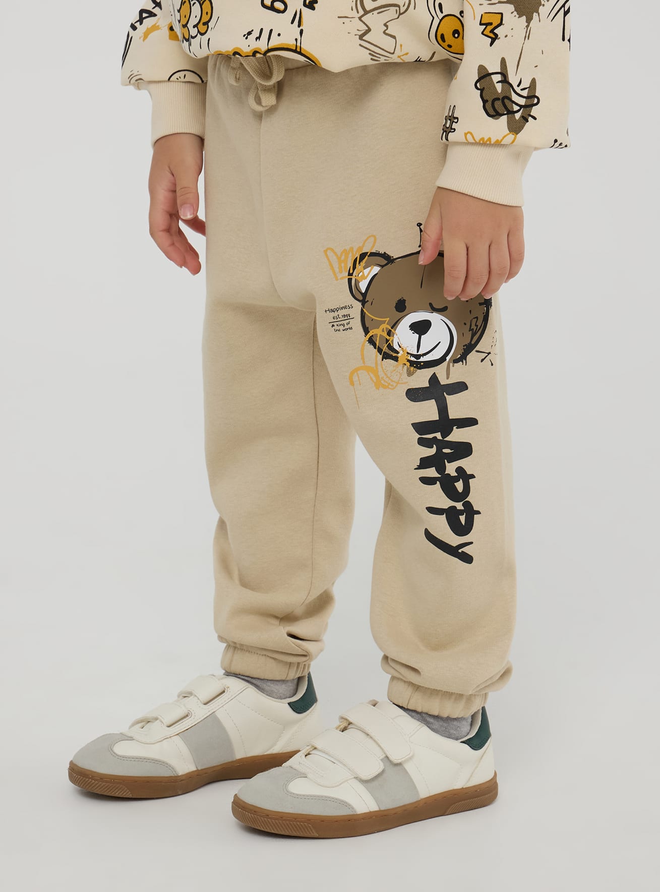 Cream Graffiti print tracksuit bottoms in heavy fabric Buy Online Terranova