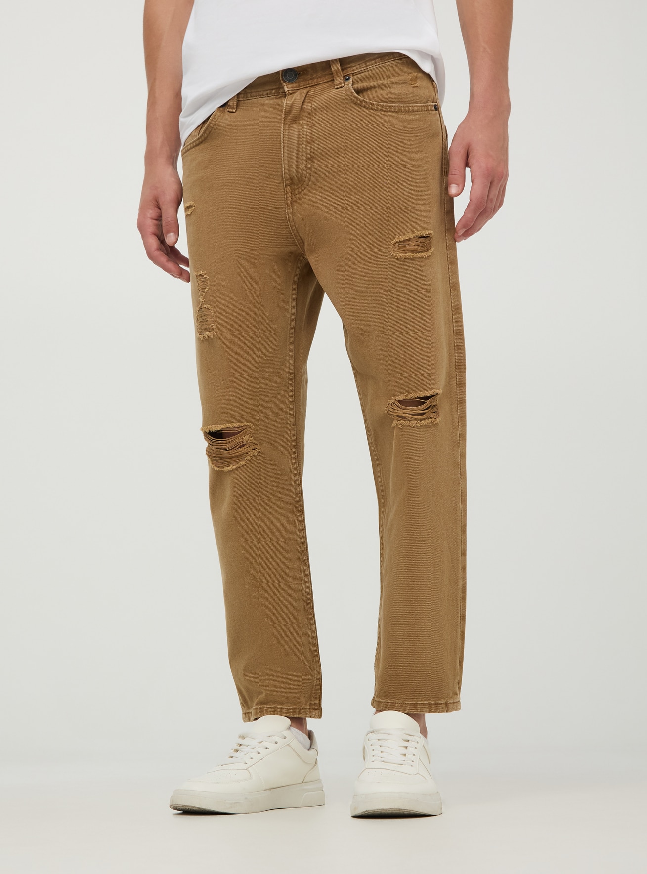 Jeans loose fit con strappi Beige Acquista Online Terranova