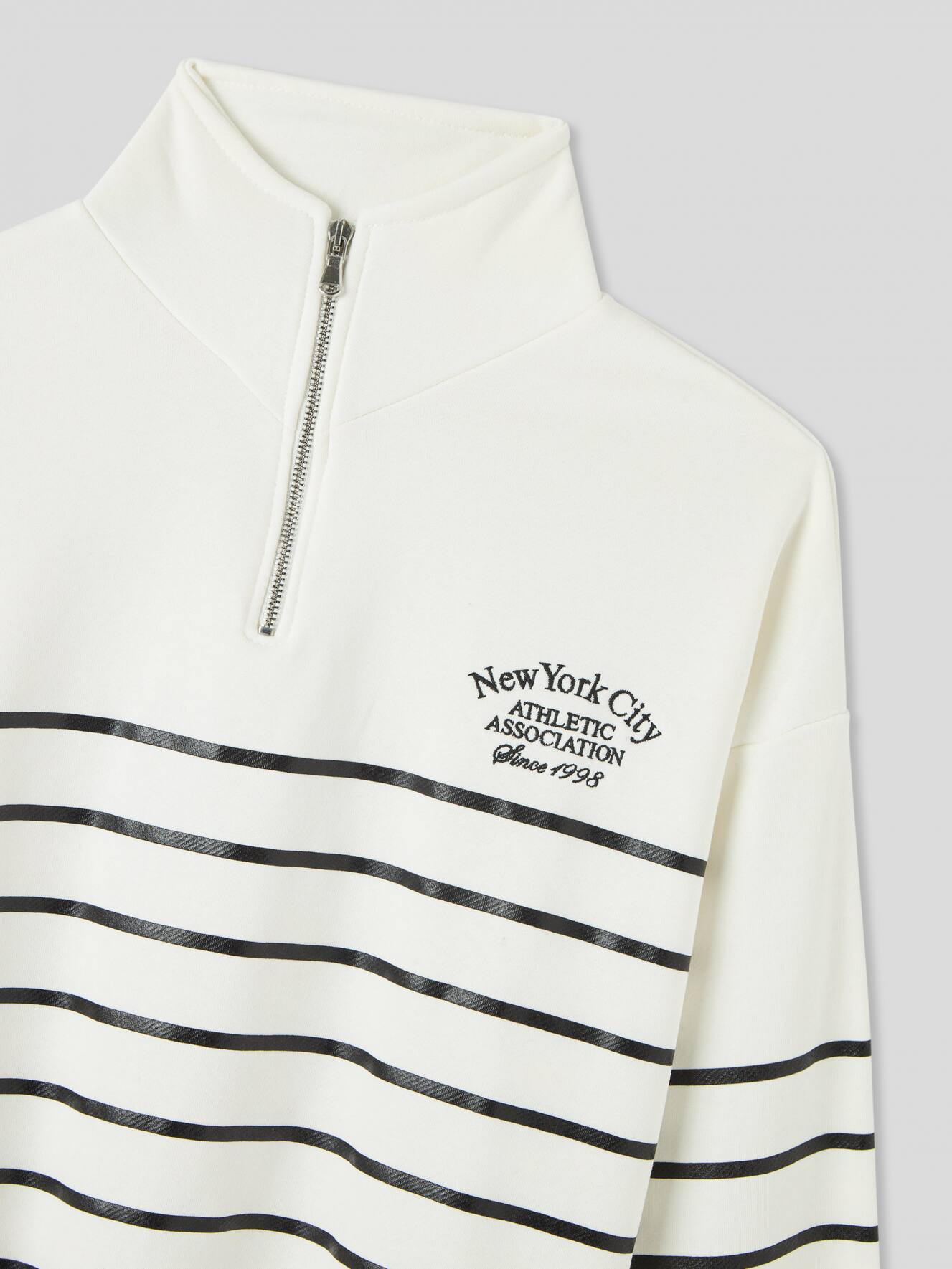 Striped half zip sweatshirt on sale