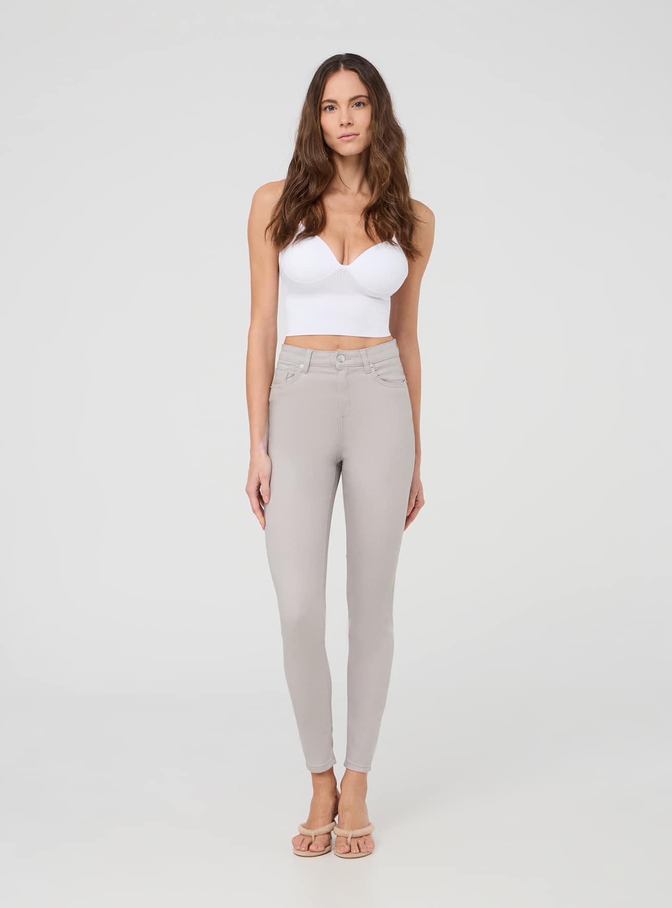 Pantaloni skinny a vita alta tinta unita