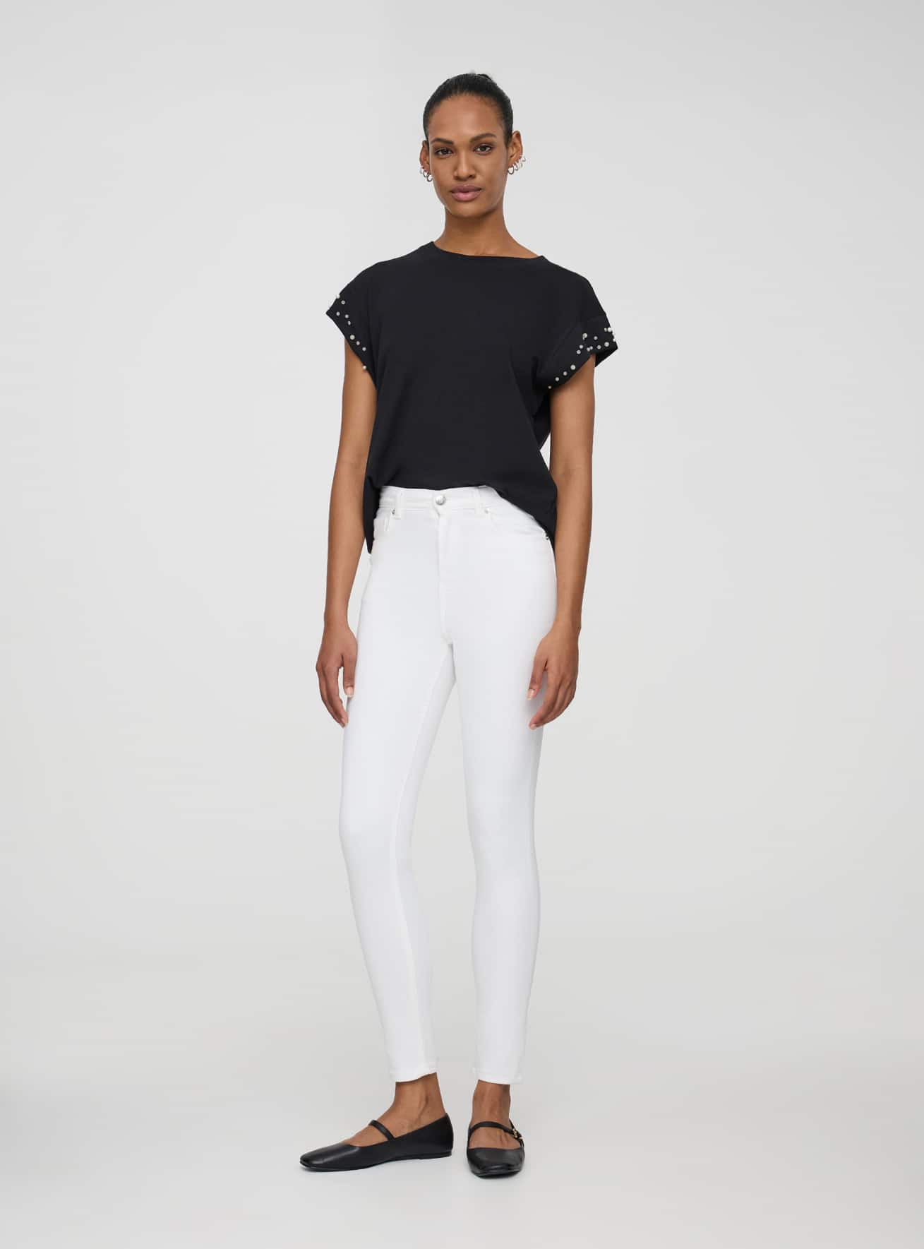 Pantaloni skinny a vita alta tinta unita