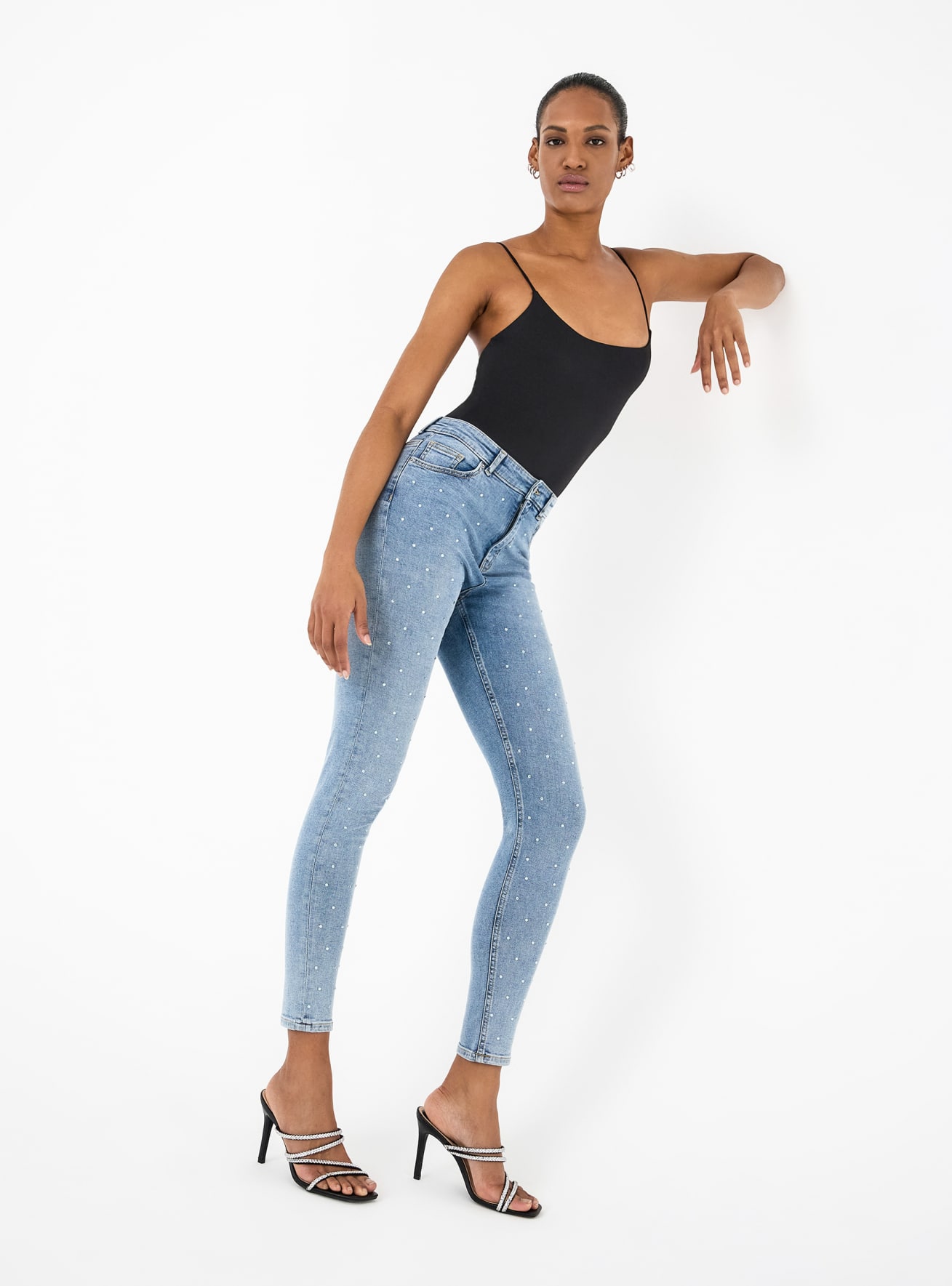 Jeans skinny con strass frontali