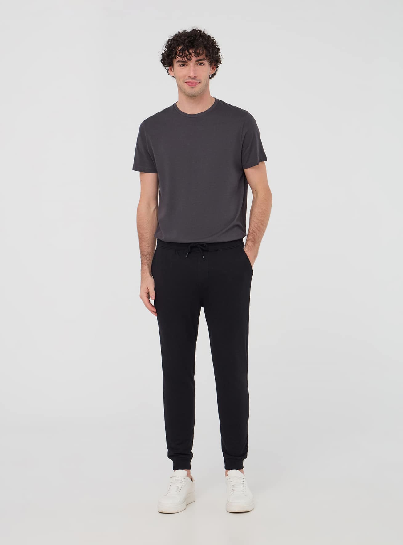 Pantaloni leggeri tuta skinny con polsini